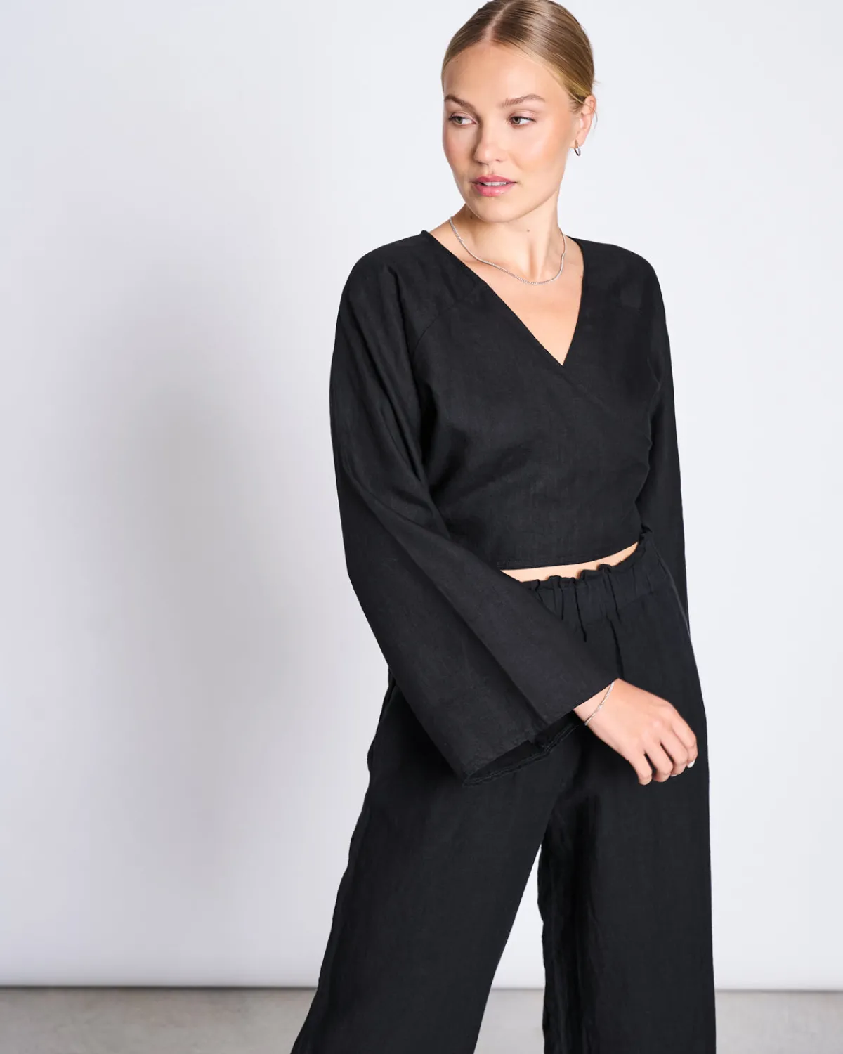 Shop JAN 'N JUNE LINEN WRAP BLOUSE RORA BLACK